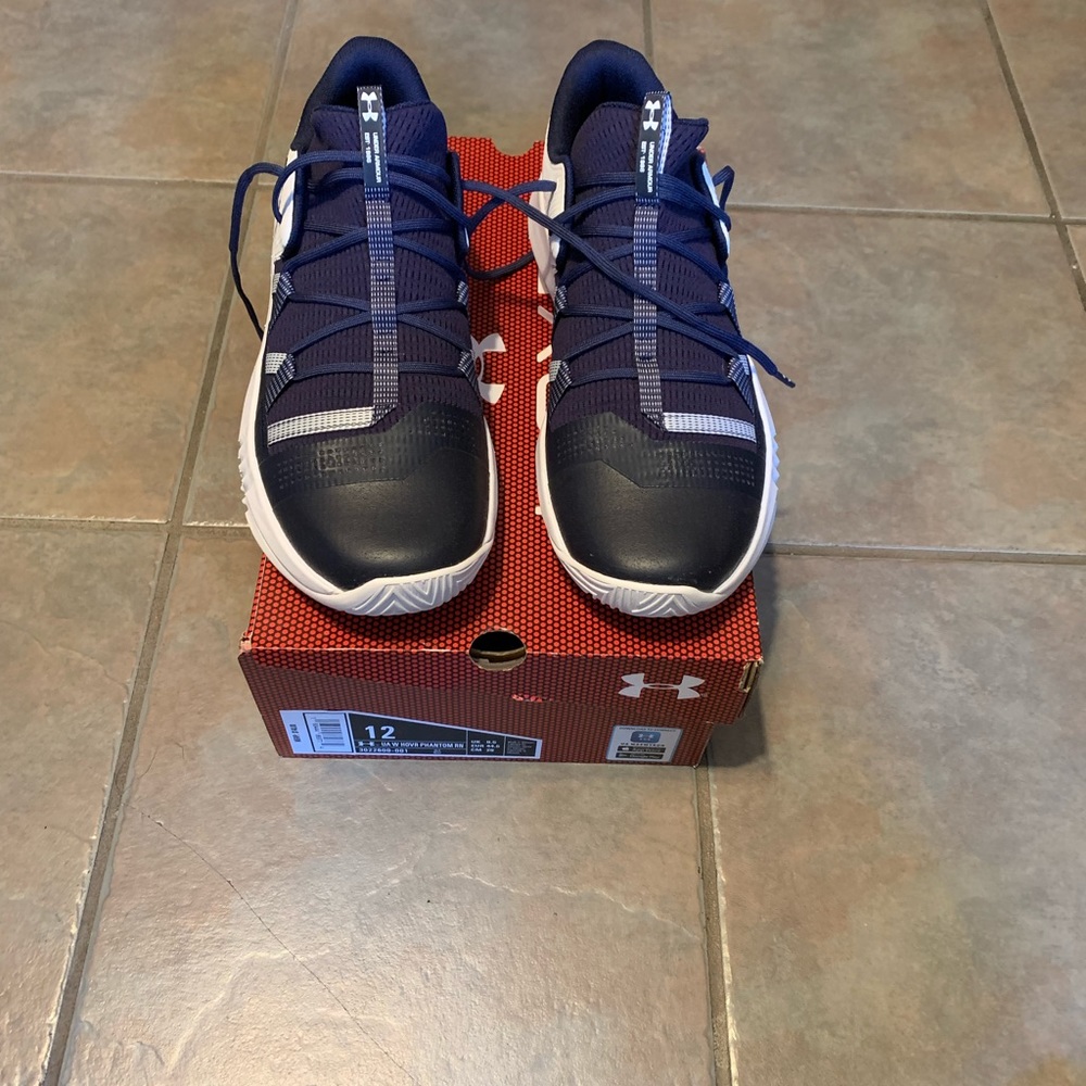 Women size 12 Under Armor shoes. Brand new, never worn.